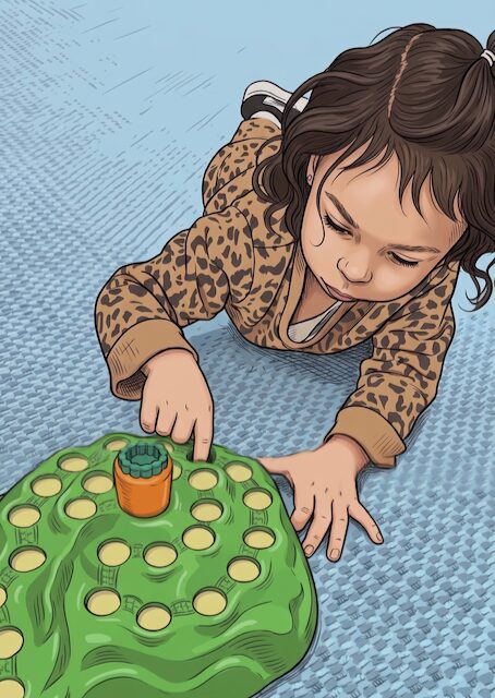 A child playing a floor game during therapy